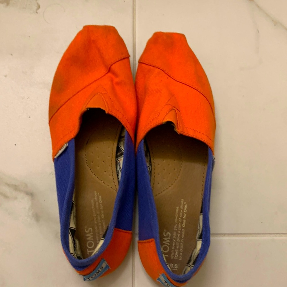 Toms 9.5 women’s orange and blue Florida gators slip on shoes